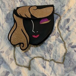Danielle Nicole Sleeping Beauty crossbody bag